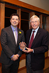 Dean David Johnsen presenting the James H. and Hermine E. McLeran Award to Dr. Chris Barwacz