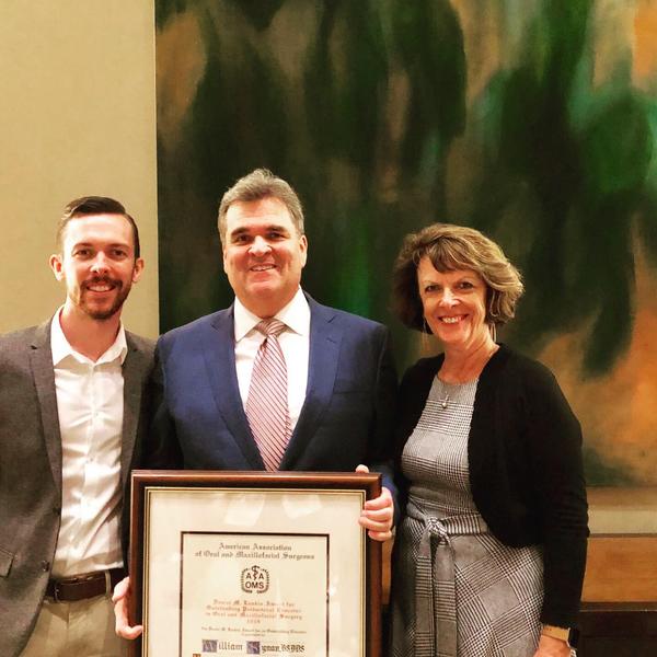 Dr. Synan with son, Nick, and wife, Ann