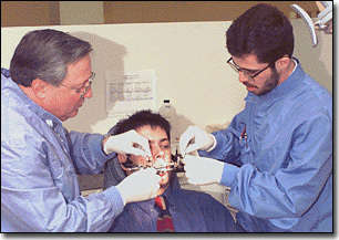 patient having braces adjusted